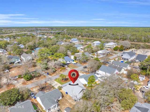 bird's eye view with a residential view and a view of trees