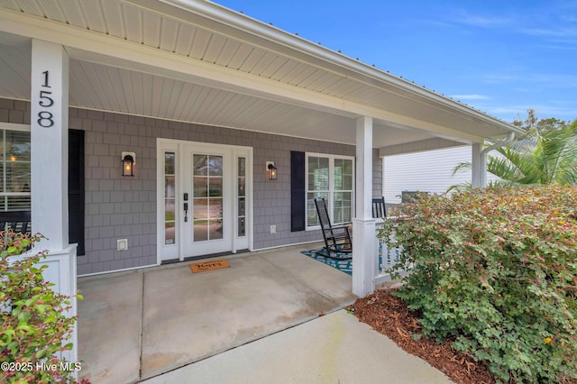 entrance to property featuring a porch