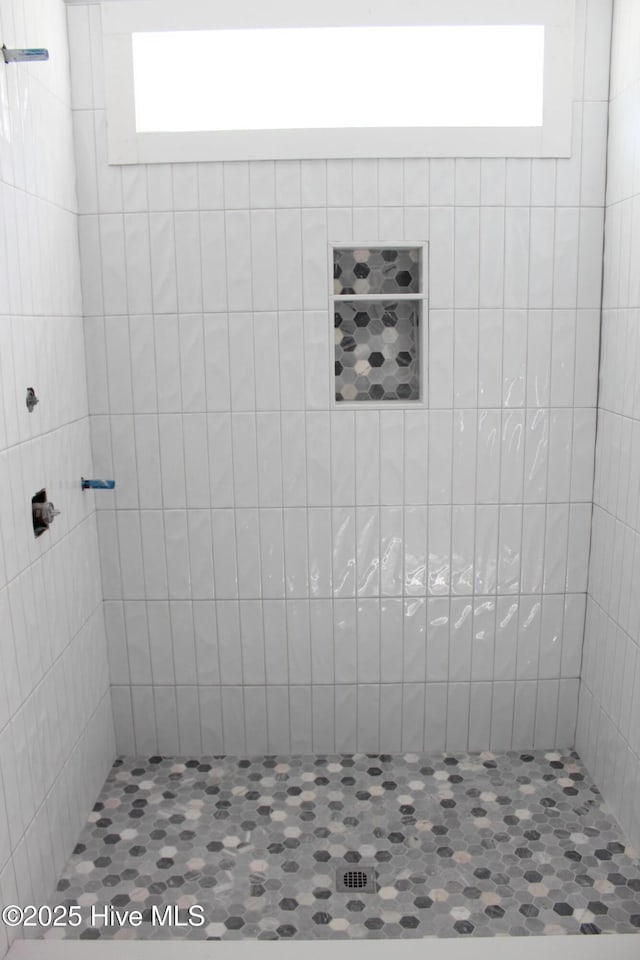104 Backfield Dr, Newport, NC 28570 - bathroom with a tile shower and healthy amount of natural light