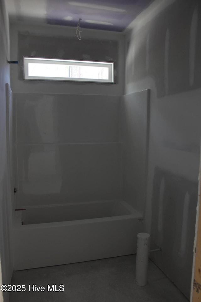 full bathroom with shower / washtub combination