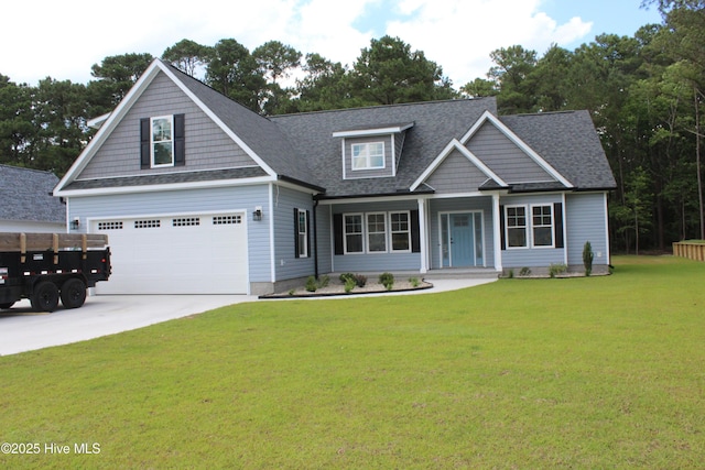 104 Backfield Dr, Newport, NC 28570 - craftsman-style house featuring a front yard, driveway, covered porch, and roof with shingles