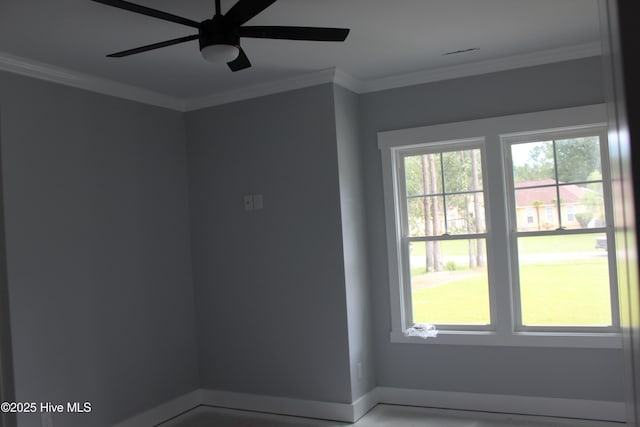 104 Backfield Dr, Newport, NC 28570 - spare room with a ceiling fan, crown molding, and baseboards