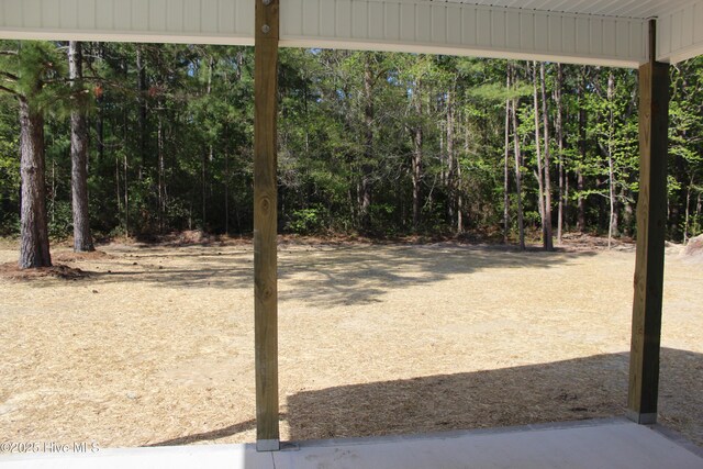 104 Backfield Dr, Newport, NC 28570 - view of yard featuring a view of trees