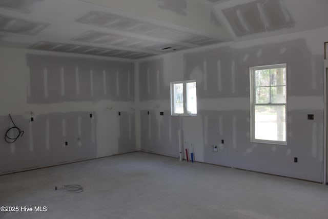 empty room featuring plenty of natural light