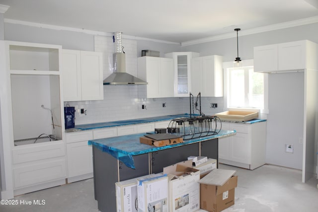 104 Backfield Dr, Newport, NC 28570 - kitchen with a sink, backsplash, white cabinets, and ornamental molding
