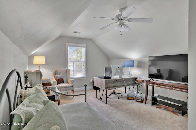 office area with light carpet, baseboards, visible vents, lofted ceiling, and ceiling fan