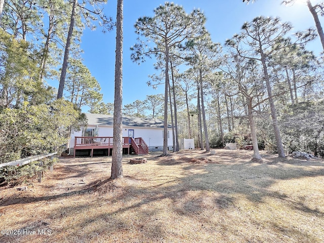 view of yard with a deck