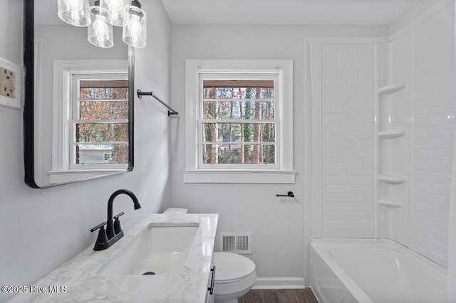 full bathroom with a wealth of natural light, baseboards, visible vents, and toilet