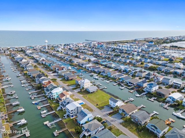 bird's eye view featuring a water view and a residential view