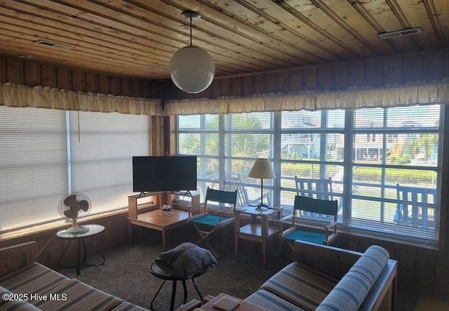 interior space featuring wood ceiling