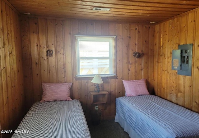 bedroom featuring wooden ceiling and visible vents