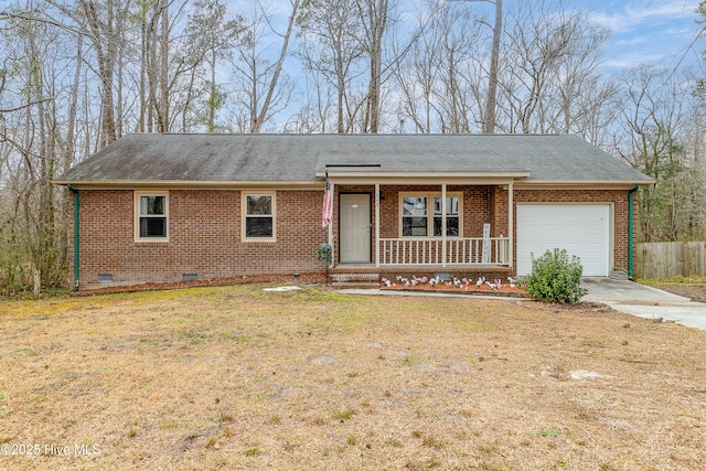 ranch-style house featuring a porch, an attached garage, concrete driveway, crawl space, and brick siding