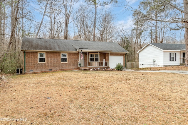 ranch-style home with crawl space, brick siding, a garage, and cooling unit