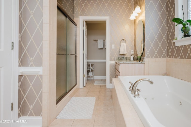 bathroom featuring a whirlpool tub, a stall shower, tile patterned floors, and wallpapered walls