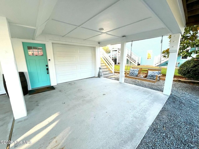 garage with driveway