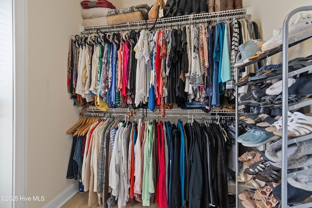 walk in closet featuring tile patterned floors