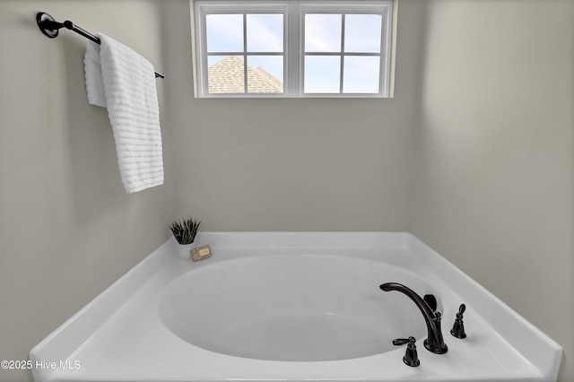 full bathroom featuring a garden tub