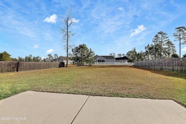 view of yard with a patio area and fence