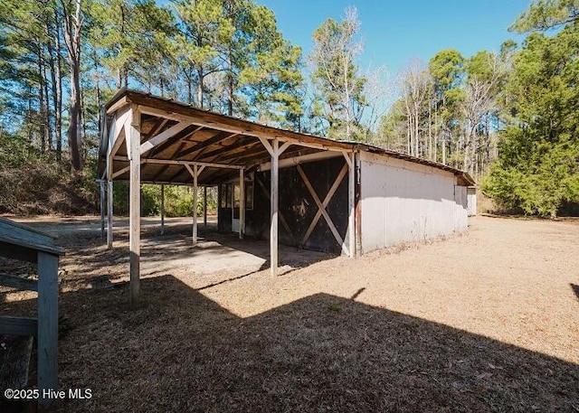 view of outbuilding with an outbuilding and a carport