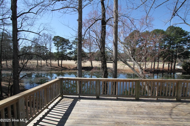 deck featuring a water view