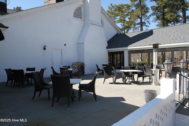 view of patio / terrace with outdoor dining area and grilling area