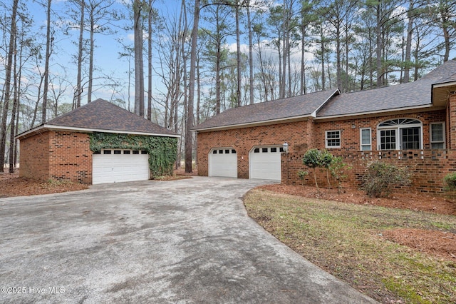 view of property exterior featuring brick siding