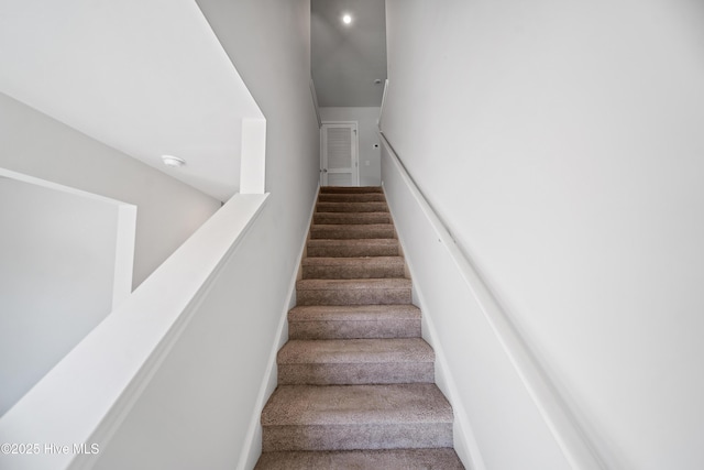 staircase with carpet