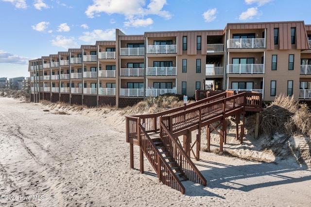 view of property's community featuring stairway