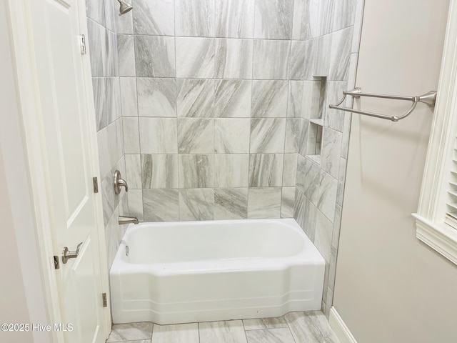 full bath featuring shower / bath combination