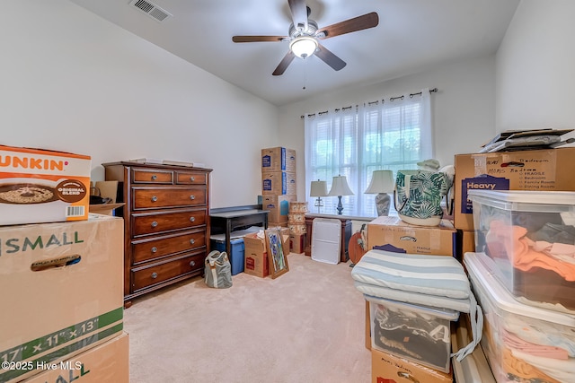 interior space featuring ceiling fan and visible vents