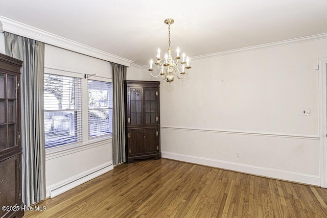 unfurnished dining area with a baseboard heating unit, baseboards, dark wood finished floors, and crown molding