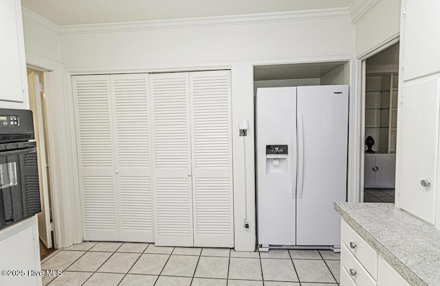 kitchen featuring white refrigerator with ice dispenser, white cabinets, ornamental molding, oven, and light countertops