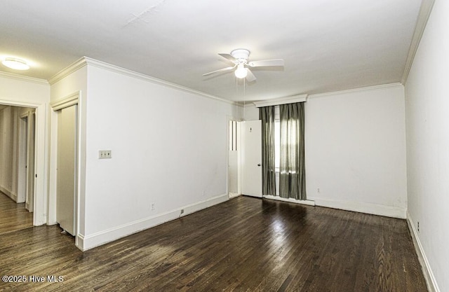 unfurnished room featuring ornamental molding, dark wood finished floors, baseboards, and ceiling fan