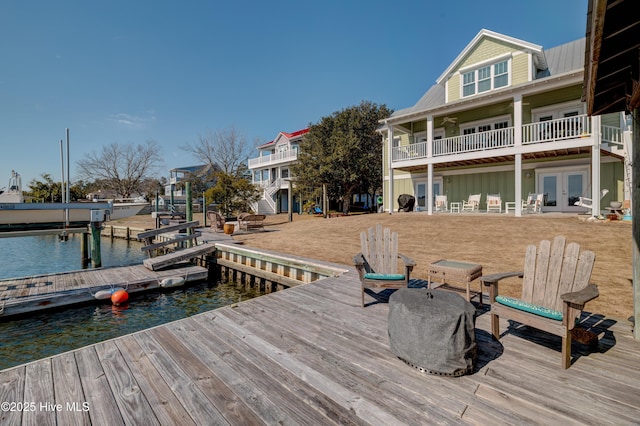 dock area with a water view