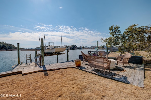 view of dock with a water view and boat lift