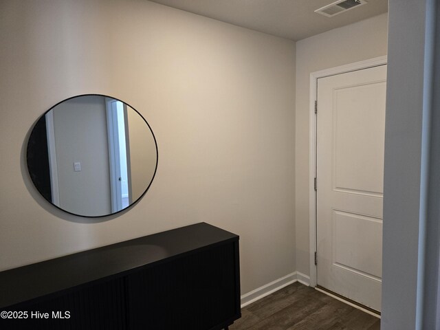 room details with wood finished floors and baseboards