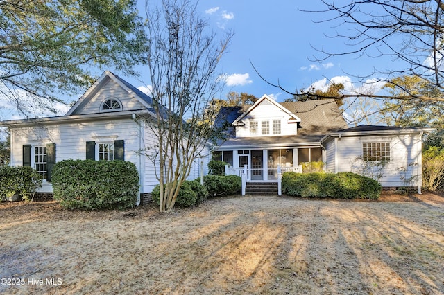 view of front facade featuring covered porch and crawl space