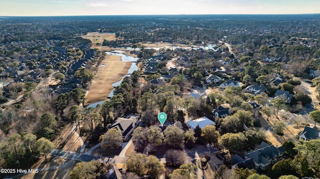 drone / aerial view with a residential view and a water view