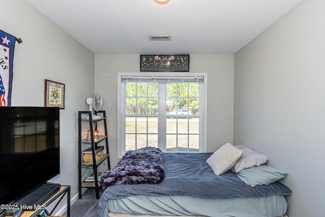 bedroom with visible vents