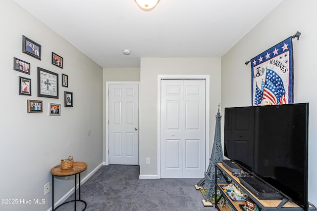 game room with baseboards and carpet floors