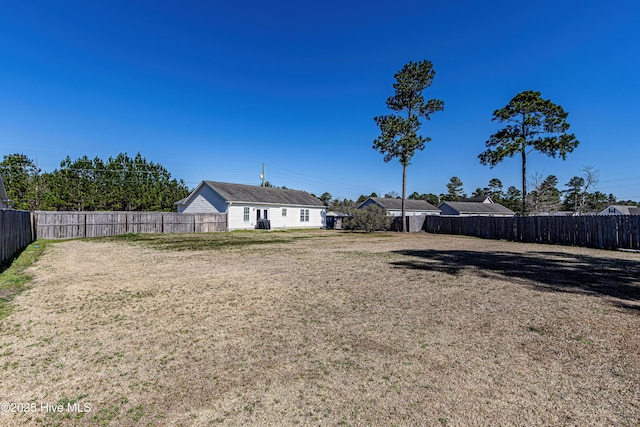 view of yard featuring a fenced backyard