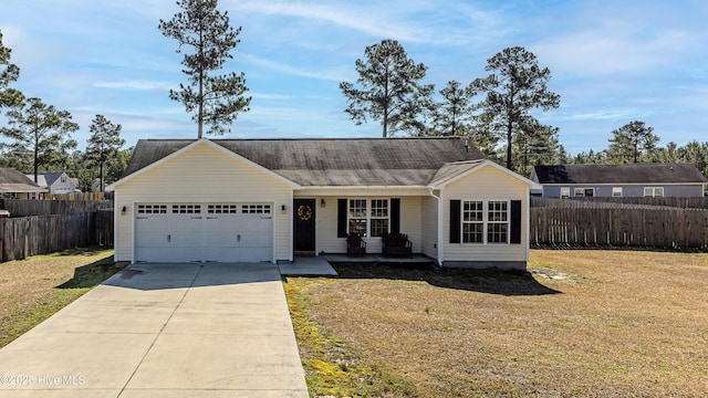 ranch-style house with a front lawn, fence, concrete driveway, an attached garage, and a shingled roof