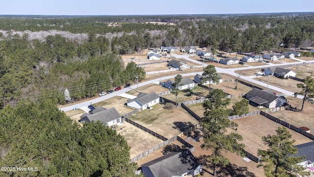 drone / aerial view with a forest view