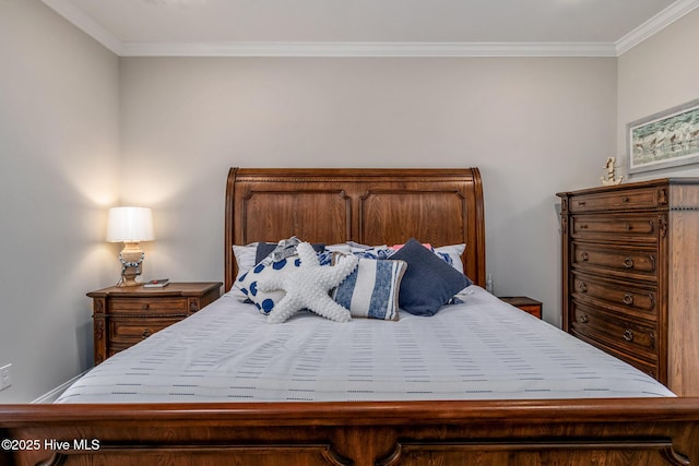 bedroom with crown molding