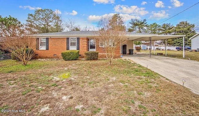 2560 Pine Springs Dr, Fayetteville, NC 28306 - view of front facade with crawl space, concrete driveway, a carport, and brick siding