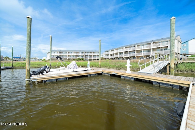 view of dock with a water view