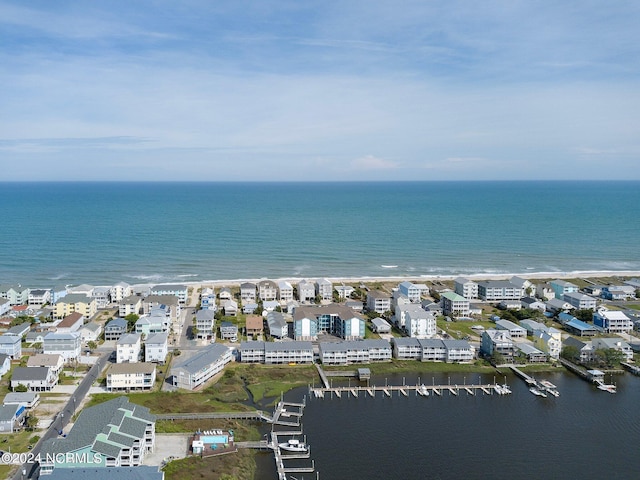 bird's eye view with a residential view and a water view