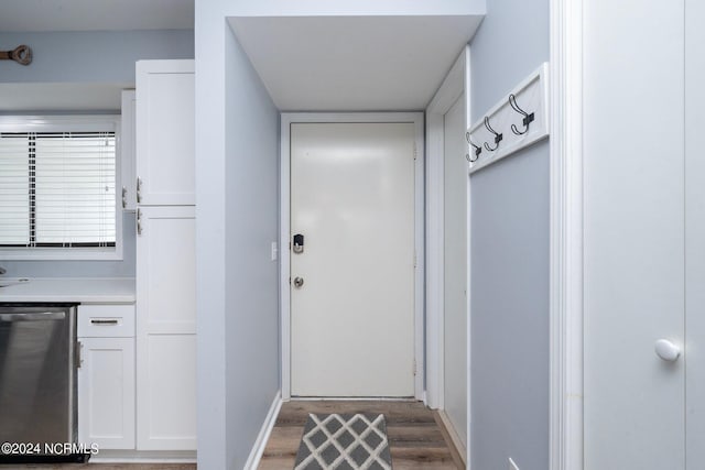 doorway to outside featuring wood finished floors