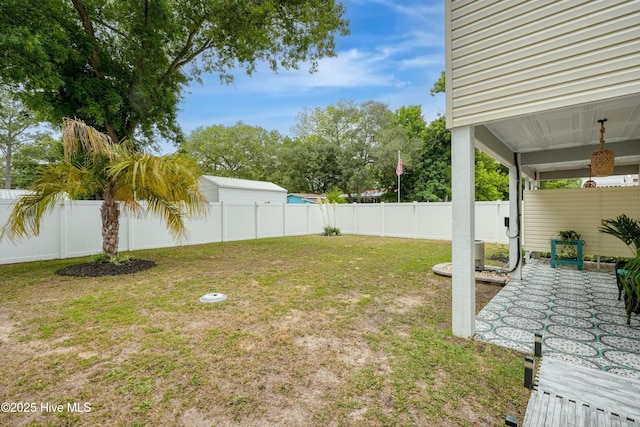 view of yard with a fenced backyard