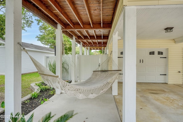 view of patio / terrace featuring fence